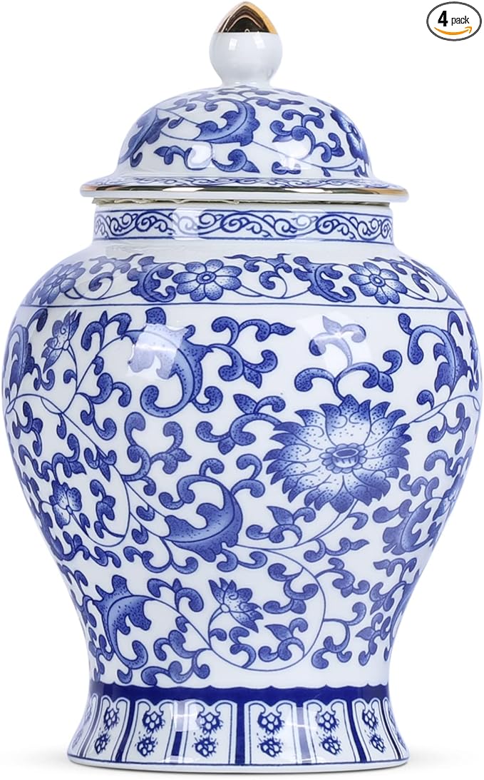 A blue and white vase with flowers on it