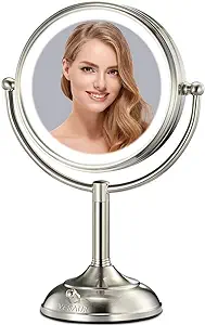 A lighted makeup mirror with a woman 's face in the middle.