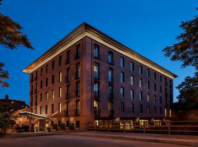 A large brick building with a lot of windows.